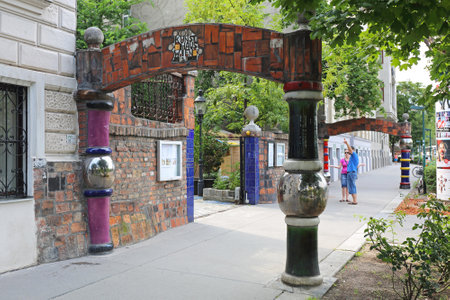 VIENNA, AUSTRIA - JULY 12: Tourists Going in Hundertwasser Museum in Wien on JULY 12, 2015. People in Front of Kunst Haus Wien Museum Designed by Artist Friedensreich Hundertwasser in Vienna, Austria.のeditorial素材