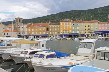 CRES, CROATIA - MAY 17: Cres Town With Port on MAY 17, 2010. Picturesque Buildings and Harbor for Boats in Cres island, Croatia.のeditorial素材