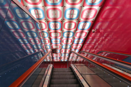NAPLES, ITALY - JUNE 25: University Metro Station in Naples on JUNE 25, 2014. Escalators in Universita Art Station Designed by Architect Karim Rashid in Naples, Italy.のeditorial素材