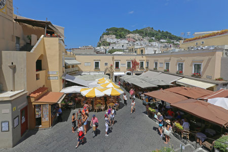 CAPRI, ITALY - JUNE 26: La Piazzetta in Capri on JUNE 26, 2014. Tourists at Square With Restaurants at Top of Island in Capri, Italy.のeditorial素材