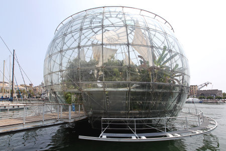 GENOA, ITALY - JULY 14: Biosphere Globe in Genoa on JULY 14, 2013. Tropical Greenhouse Glass Sphere Docked at Port in Genoa, Italy.のeditorial素材