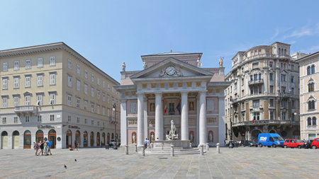 TRIESTE, ITALY - JULY 15: Palazzo della Borsa Vecchia Trieste on JULY 15, 2013. Palazzo della Borsa Vecchia at Piazza della Borsa Square in Trieste, Italy.のeditorial素材