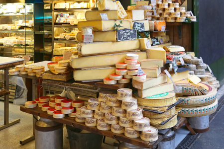 LONDON, UNITED KINGDOM - NOVEMBER 20: Cheese shop in London on NOVEMBER 20, 2013. A Variety of Cheeses for Sale at Borough Market in London, United Kingdom.のeditorial素材