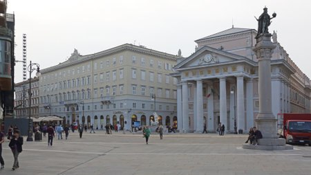TRIESTE, ITALY - OCTOBER 13: Piazza della Borsa Square Trieste on OCTOBER 13, 2014. Palazzo della...
