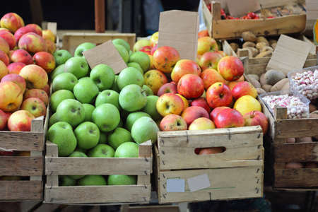 Apples Fruits in Wooden Crates at Farmers Marketの写真素材