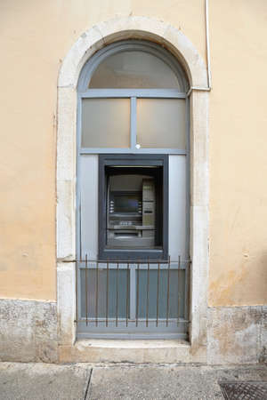 Automated Teller Machine in Arch Windowの写真素材