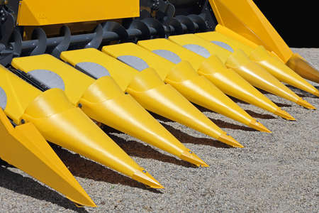 Corn Harvester With Yellow Head Blades