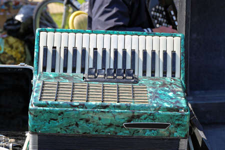 Used Green Piano Accordion Musical Instrument at Flea Market