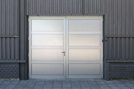 Silver Door at Warehouse Storage Buildingの写真素材