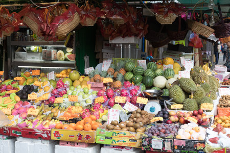 KOWLOON, HONG KONG - APRIL 21, 2017: Fresh Fruits and Vegetables at Street Market in Kowloon, Hong Kong.のeditorial素材