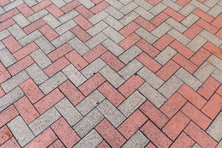 Red and Gray Bricks Pavement Pattern Backgroundの写真素材