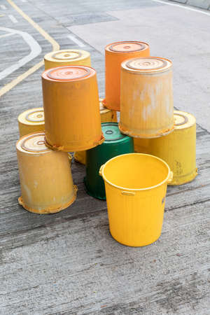 Bunch of Yellow Buckets at Street in Hong Kong