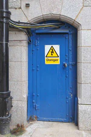 Blue Metal Door With Electric Cablesの写真素材
