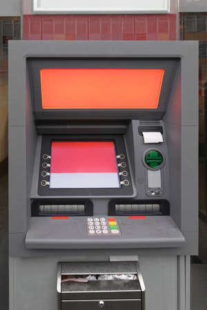Automated Teller Cash Machine in Shop Windowの写真素材