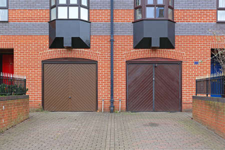 Two Garage Doors at Residential Buildingの写真素材
