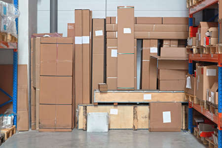 Shipping Packages Boxes in Distribution Center Warehouseの写真素材