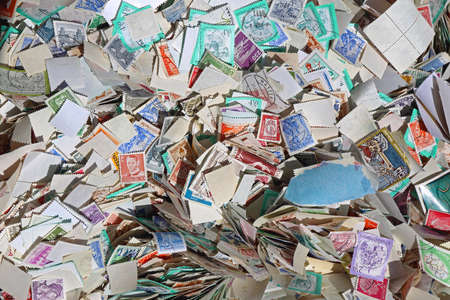 Unsorted Used Postage Stamps at Flea Marketの写真素材