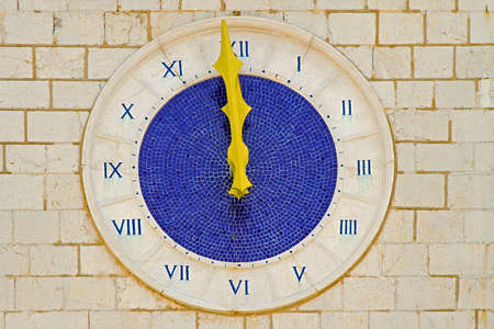 Twelve o Clock at Old Blue Roman Clockの写真素材