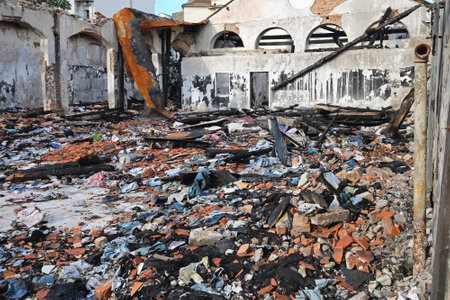 Burned Sweatshop Garment Factory After Fire Disasterのeditorial素材