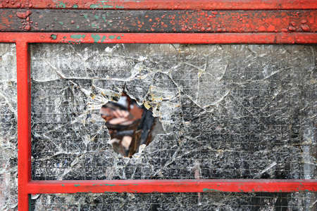 Hole in Tempered Safety Glass Damageの写真素材