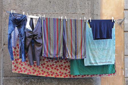 Drying Laundry at Clothes Line in Italyの写真素材