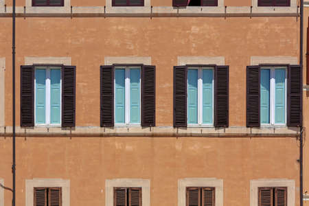 Four Window With Blinds at Building in Romeの写真素材