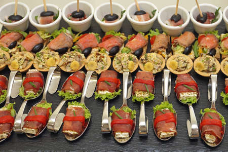 Modern Canapes Food Served in Bended Spoons