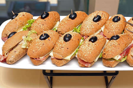 Ham Sandwiches in Wholegrain Buns With Olivesの写真素材