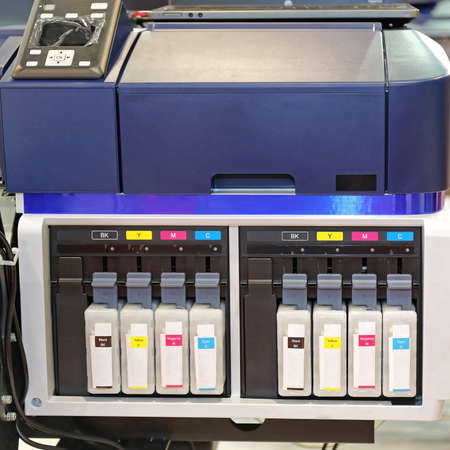 Eight Ink Cartridges in Big Inkjet Printerの写真素材