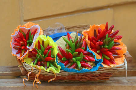 Various Hot Chili Peppers in Basketの写真素材