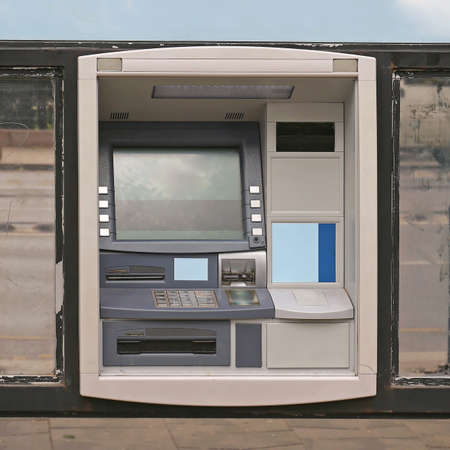 Atm Automated Teller Machine at Bank Window Exterior