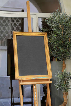 Easel Menu Frame Black Board at Restaurantの写真素材