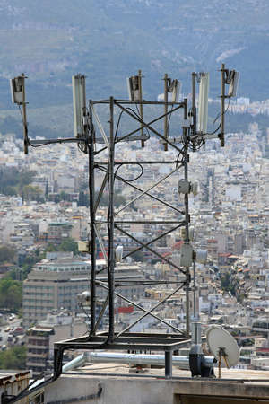 Mobile Phone Antenna Base Station Communication Tower in City
