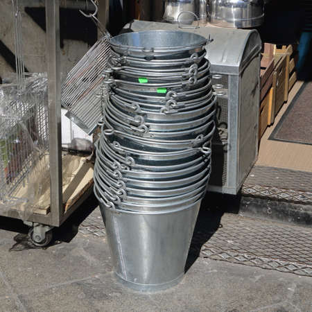 Big Pile of Stucked New Metal Buckets