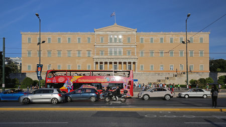 ATHENS, GREECE - MAY 01, 2015: Sightseeing Bus in Front of Greek Parliament Building in Athens, Greece.のeditorial素材