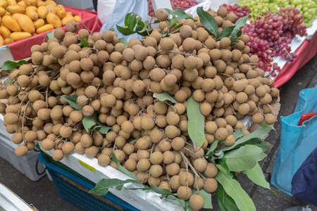 Big Bunch of Longan Tropical Fruits at Market