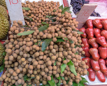 Big Bunch of Longan Tropical Fruits at Market