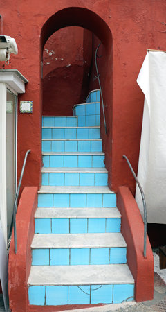 Blue Stairs at Red Building With Arch Way Capri,のeditorial素材
