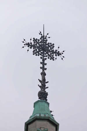 Big Cross at Top of Notre Dame Cathedral in Paris France