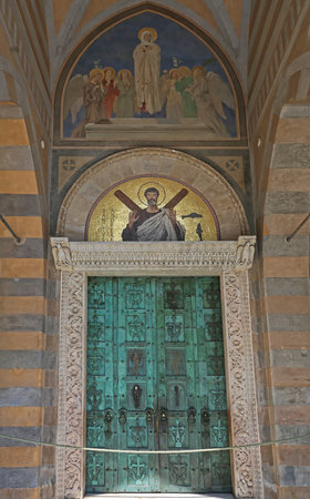 Amalfi, Italy - June 27, 2014: Big Green Door With Fresco Mosaic at Apostle Saint Andrew Cathedral in Amalfi, Italy.のeditorial素材