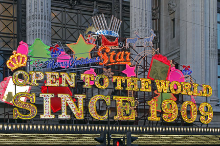 London, United Kingdom - December 25, 2009: Merry Christmas Star Open To The World Since 1909 Sign Lights at Selfridges in London, UK.のeditorial素材