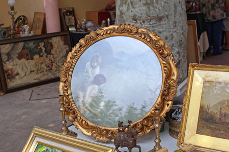 Cannes, France - July 13, 2013: Picture Frames and Mirrors for Sale at Saturday Antique Market in Cannes, France.のeditorial素材