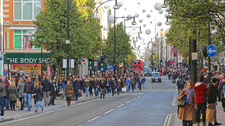 London, United Kingdom - November 23, 2013: Oxford Street Crowded With People at Winter in London, UK.のeditorial素材