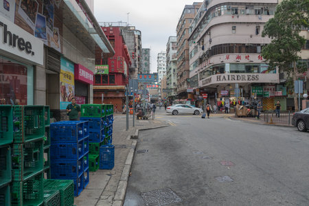 KOWLOON, HONG KONG - APRIL 21, 2017: Water Bottles Crates Delivery at Mong Kok in Kowloon, Hong Kong.のeditorial素材