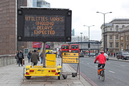 London, United Kingdom - January 25, 2013: Delays Expected Traffic Information Board Message Sign at Southwark in London, United Kingdom.のeditorial素材