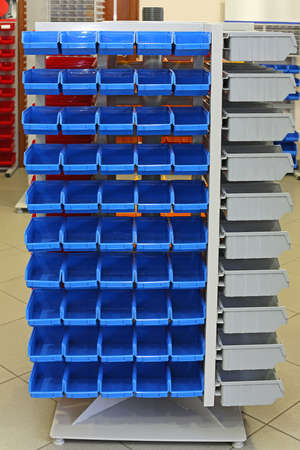 Storage Organizer Rack With Blue Plastic Sorting Bins