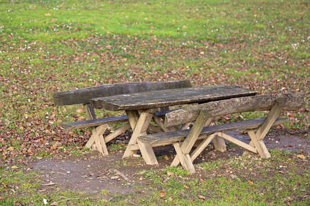 Empty Wooden Picnic Table With Bench in Parkの写真素材