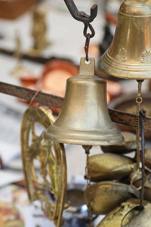 Used Brass Bells at For Sale Flea Marketの写真素材