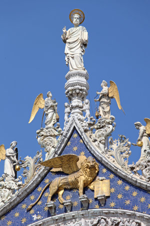 VENICE, ITALY - JULY 08, 2013: Saint Mark and Golden Lion of Venice at St. Marks Church in Venice, Italy.のeditorial素材