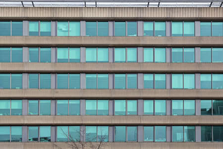 Office Building With Green Windows in London